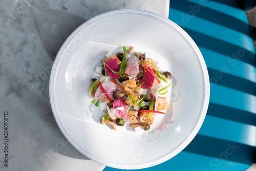 Tableau sur toile Colorful Culinary Creation Featuring Fresh Ingredients on a Sunny Table