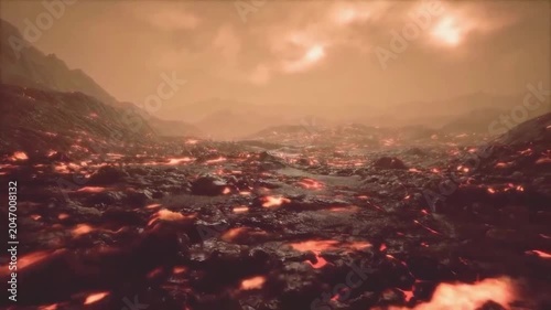Animation of the hellish surface of planet Venus. Hell landscape with glowing red lava cracks on volcanic rocks under a dense orange toxic atmosphere and clouds.