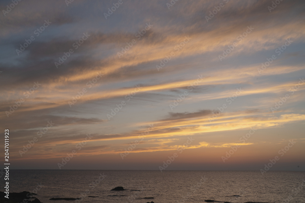 Fototapeta premium Hokkaido, cloud layers and coast, with sea, in september, nature