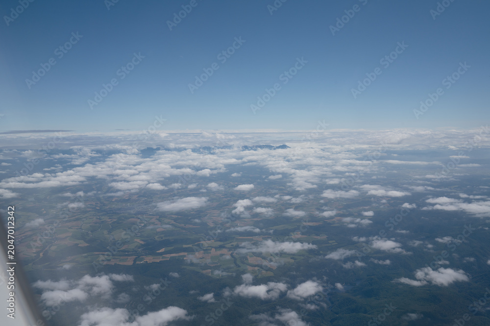Fototapeta premium Hokkaido, sea of clouds and cloud layers, with mountain ridges, in august, panorama