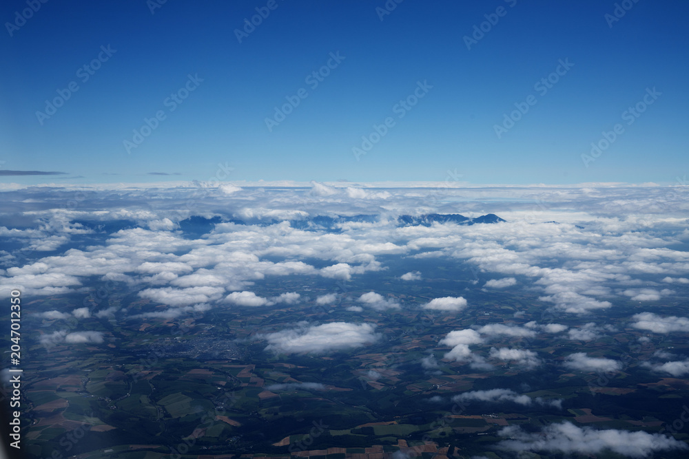 Fototapeta premium Hokkaido, sea of clouds and cloud layers, with mountain ridges, in august, scenic view