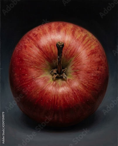 Red apple stem detail overhead dark background