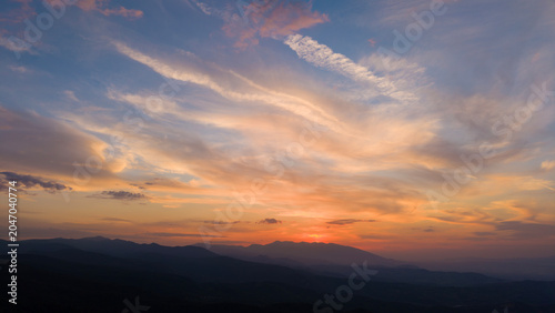 A sunny day in Türkiye, a colorful, vibrant blue sky and thin, white, tinted clouds.