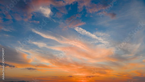 A sunny day in Türkiye, a colorful, vibrant blue sky and thin, white, tinted clouds.