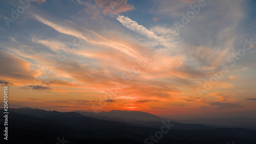 A sunny day in Türkiye, a colorful, vibrant blue sky and thin, white, tinted clouds.
