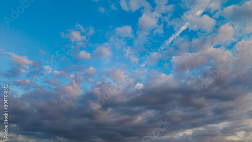 A sunny day in Türkiye, a colorful, vibrant blue sky and thin, white, tinted clouds.