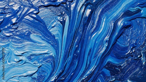 Macro close up of thick blue oil paint texture on canvas surface abstract art brushstrokes background color