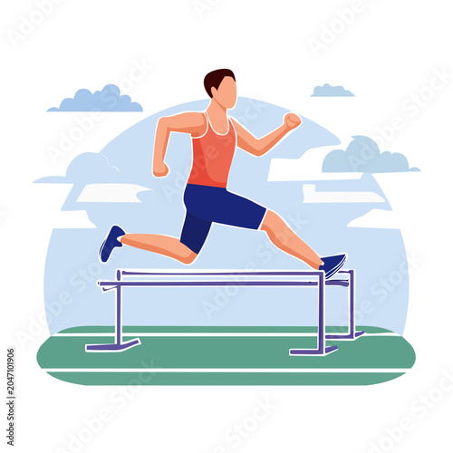 Man jumping over hurdle on track