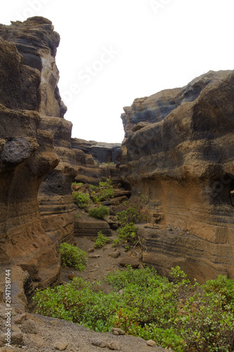 Dramatic Volcanic Rock Formations in Abandoned  Quarry Cueva Herrera in Galdar, Gran Canaria