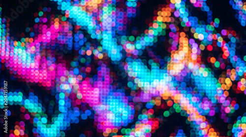 This image is an abstract and colorful background of bright, glowing light dots.
