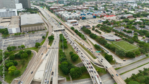 Tableau sur toile Aerial view of Houston Texas freeway with traffic and city streets