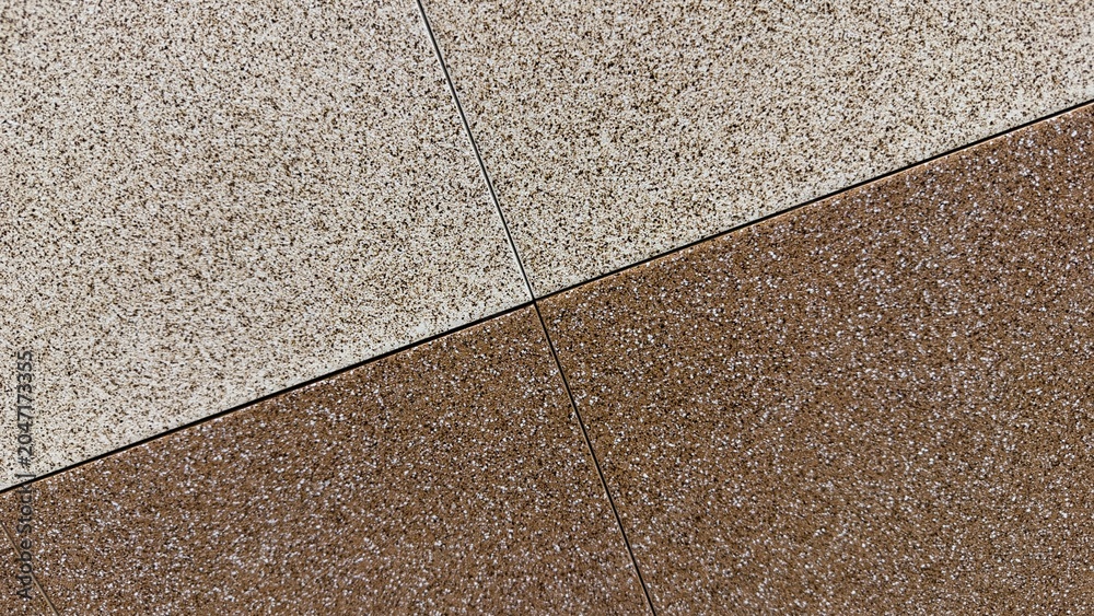 Fototapeta premium Minimalist geometric tile texture, diagonal brown and beige speckled stone background for layout