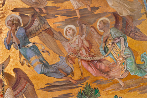 MONZA, ITALY - MARCH 19, 2026: The fresco of angel adorated Jesus the Pantokr...