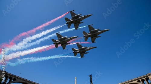 Fighter jets in formation with colored smoke trails flying over city landmarks against clear blue sky