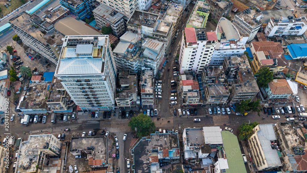 Fototapeta premium Aerial view of Dar es Salaam highlighting cityscape, business growth, and modern architectural development.