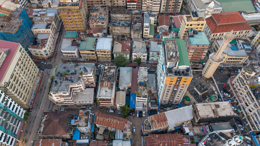 Fototapeta premium Aerial view of Dar es Salaam highlighting cityscape, business growth, and modern architectural development.