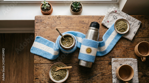 Cozy High Quality Still Life Photography Of A Traditional Argentine Mate Gourd Wrapped In An Argentina Flag Scarf