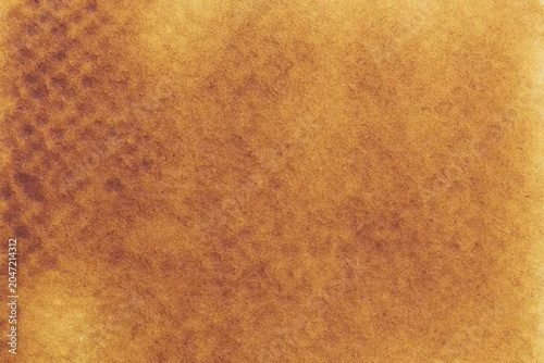 Warm watercolor background, orange and brown with granulation on paper