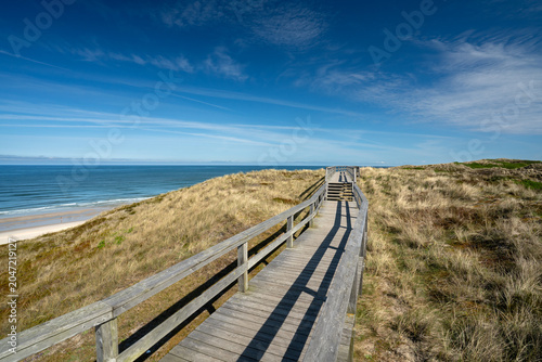 old wooden path to the sea on the island Sylt