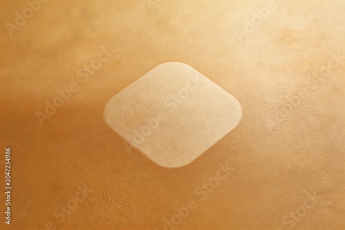 Closeup of a square patch on textured surface