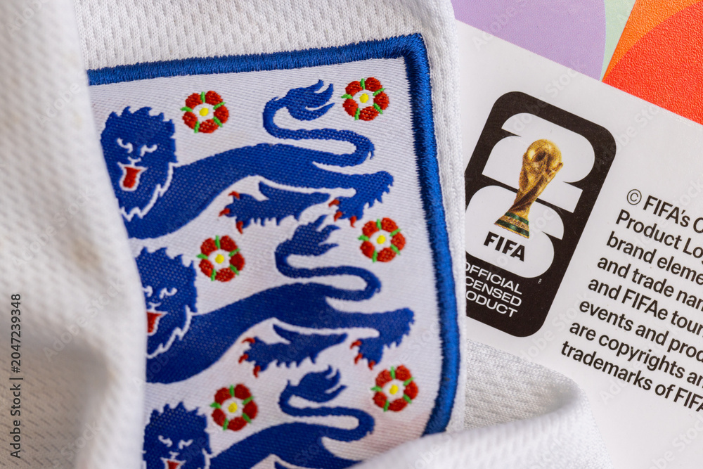 Naklejka premium LONDON, UK - JUNE 2026: England 3 lions football team logo alongside the 2026 world cup logo