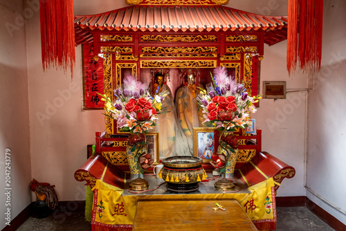Bild auf Leinwand an ornate altar inside a Chinese temple in old water town in Shanghai Qingpu Dis