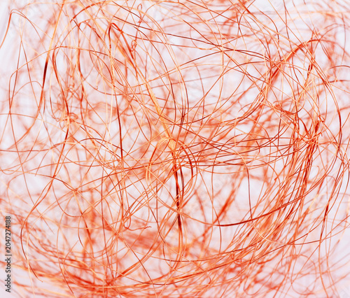 A crumpled coil of copper wire in close-up