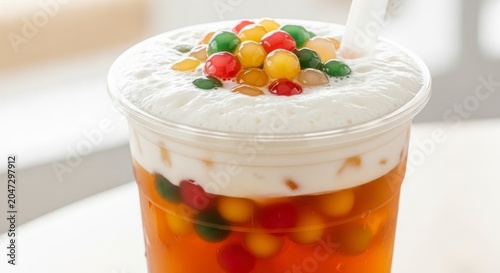 Vibrant Rainbow Popping Boba on a Cloud of Creamy Cheese Foam Iced Tea
