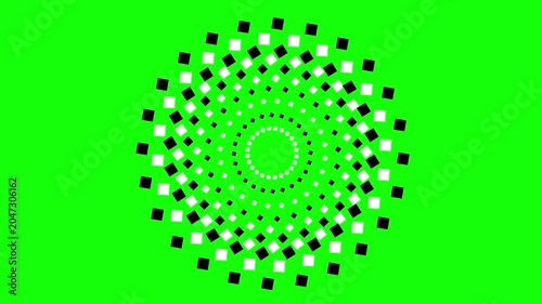 Rotating Black and White Squares on Green Background