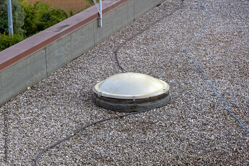 One Dome Skylight at Gravel Flat Roof Industrial Building