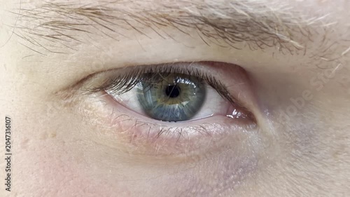 Close-up of a young man's open eye