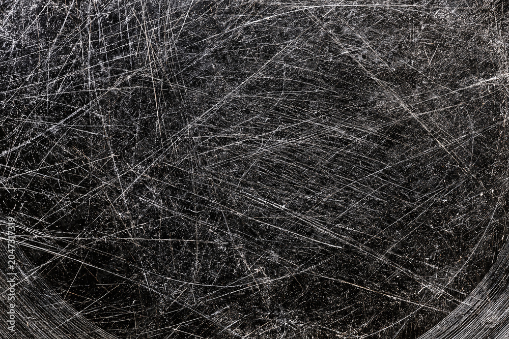 Fototapeta premium Heavy scratched black surface texture abstract background