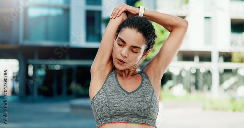 Bild auf Leinwand Woman, fitness and stretching with arms in city for wellness, breathing and circulation for muscle