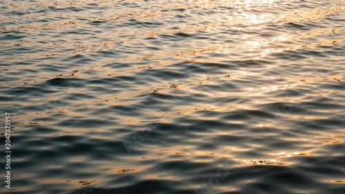 Aerial view of a textured landscape with water and earth