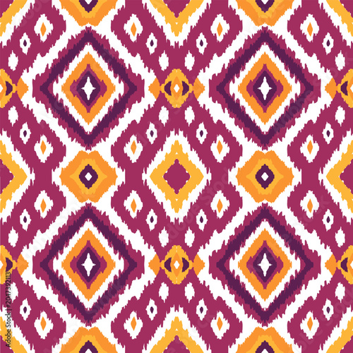 Magenta and yellow tribal ornament seamless pattern, boho chic textile design