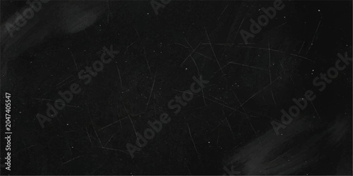 Cuadro en lienzo A close-up shot of dust motes and fine scratches on a dark, textured surface, creating an abstract, gritty aesthetic