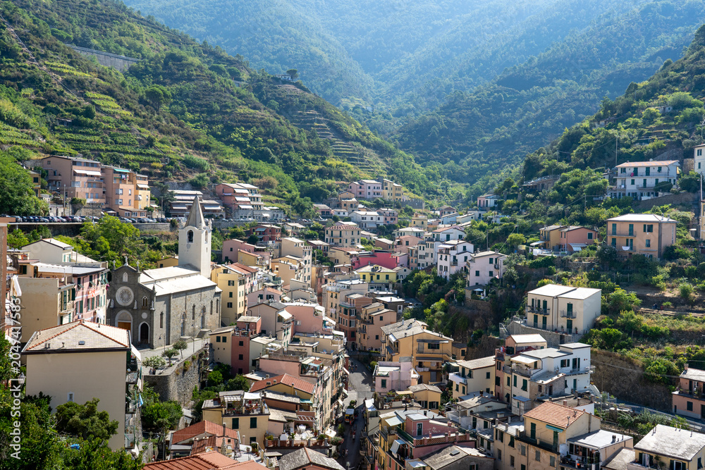 Fototapeta premium Panoramic view of Riomaggiore village in Cinque Terre