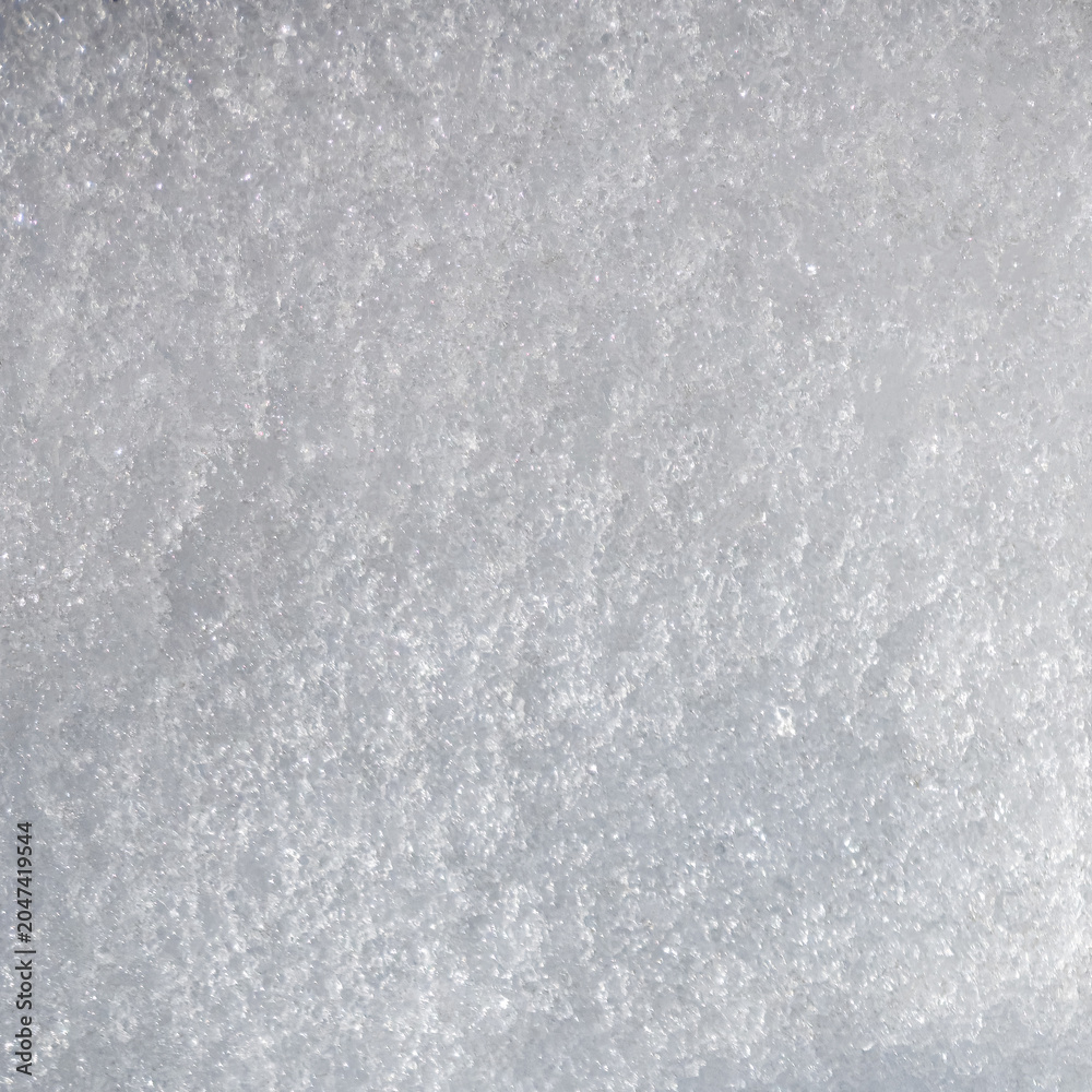 Fototapeta premium Macro shot of frozen diamond dust snow surface