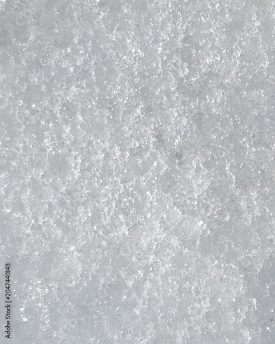 Vertical abstract macro texture of white winter snow