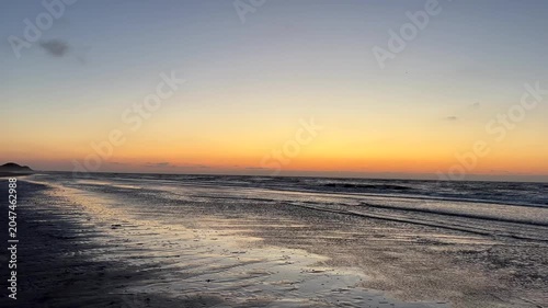 Norderney beach at dusk with copy space