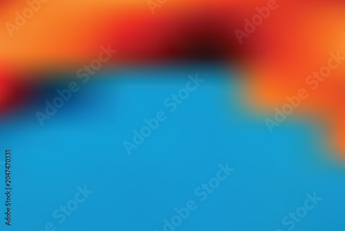 Vibrant orange and red hues blend over a serene blue transparent water surface.