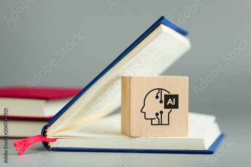 Foto Open book and AI symbol representing AI assisted learning, knowledge discovery,