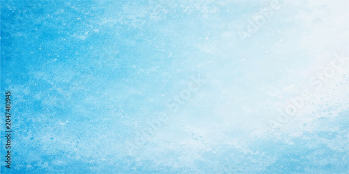 Quadro su tela Sky Canvas: A vibrant blue sky fills the frame, dotted with wispy white clouds, evoking a sense of boundless freedom and serenity, with a bright light emanating from the upper right corner
