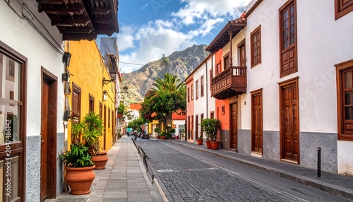 A picturesque street with colorful buildings and potted plants