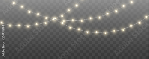 Christmas string lights garland isolated on dark background. Colorful glowing bulbs for decoration. Perfect for posters and promotional art.