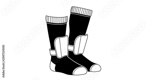 Bild auf Leinwand Pair of black athletic socks with integrated shin guards for sports