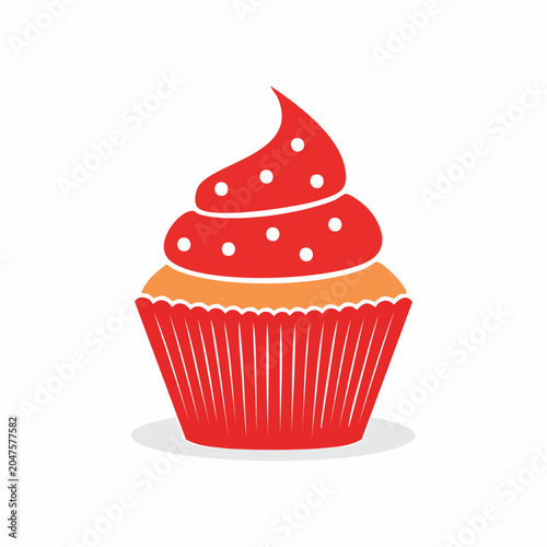 Red cupcake with white dots on frosting