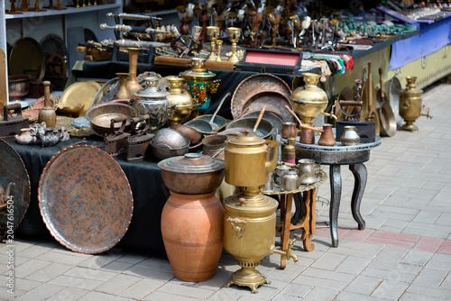 Bild auf Leinwand Crowded Stall of Vintage Samovars and Household Items in Armenia