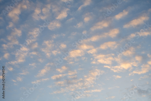 Blue Sky with Soft Cirrocumulus Clouds Background Texture