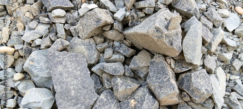 Photos Split mountain rocks for road base foundation
